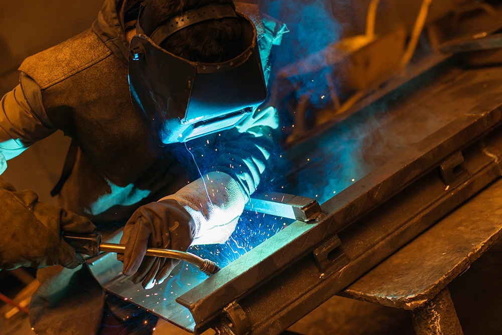 man welding
